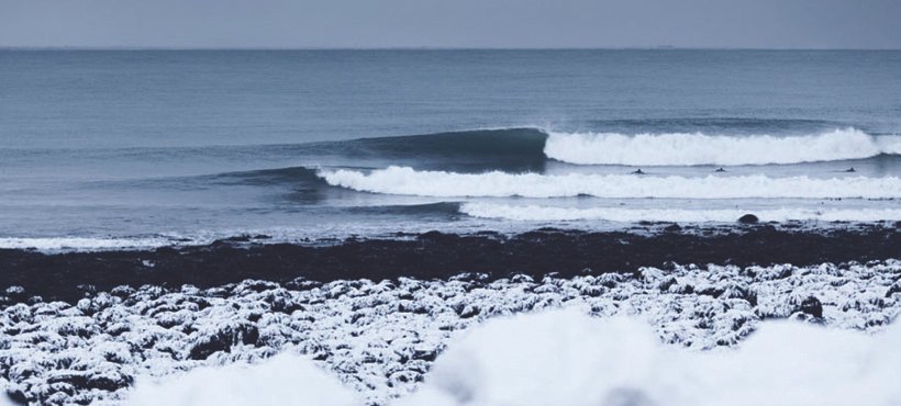 Фотография холодный серфинг в Исландии сет волн